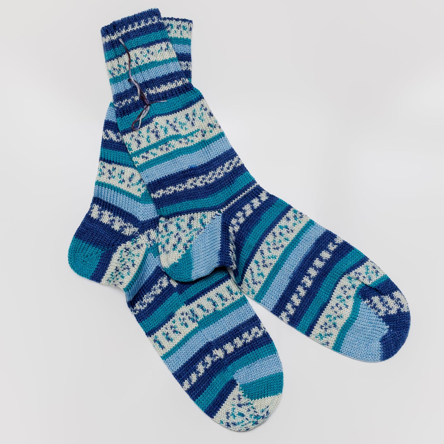 Handmade wool socks for men and women, Cozy warm winter socks hand-knitted, Soft wool socks for everyday wear, Handcrafted wool socks gift idea, Thick warm socks for cold weather, Unique handmade knitted wool socks, Stylish winter wool socks for comfort