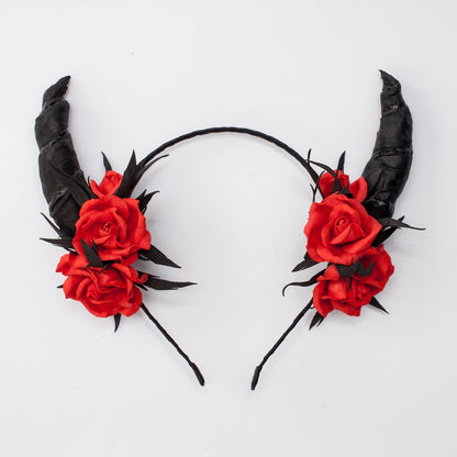 Black horns headband with red roses for Halloween party.
