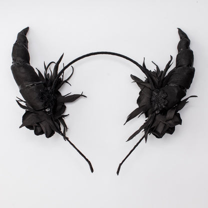 Black horns headband with roses for Halloween party.