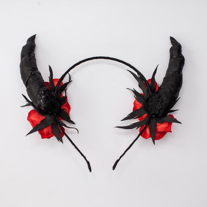 Black horns headband with red roses for Halloween party.