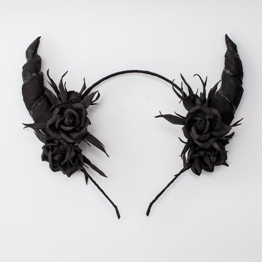 Horns headband for Halloween party. Black horns headpiece with flowers.