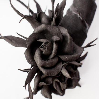 Black horns headband with roses for Halloween party.