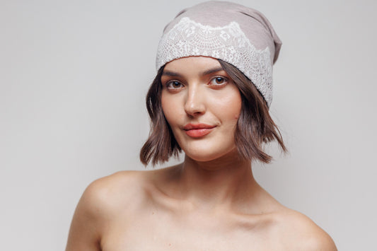 Beige slouchy beanie hat with lace. Cotton headwear size S.