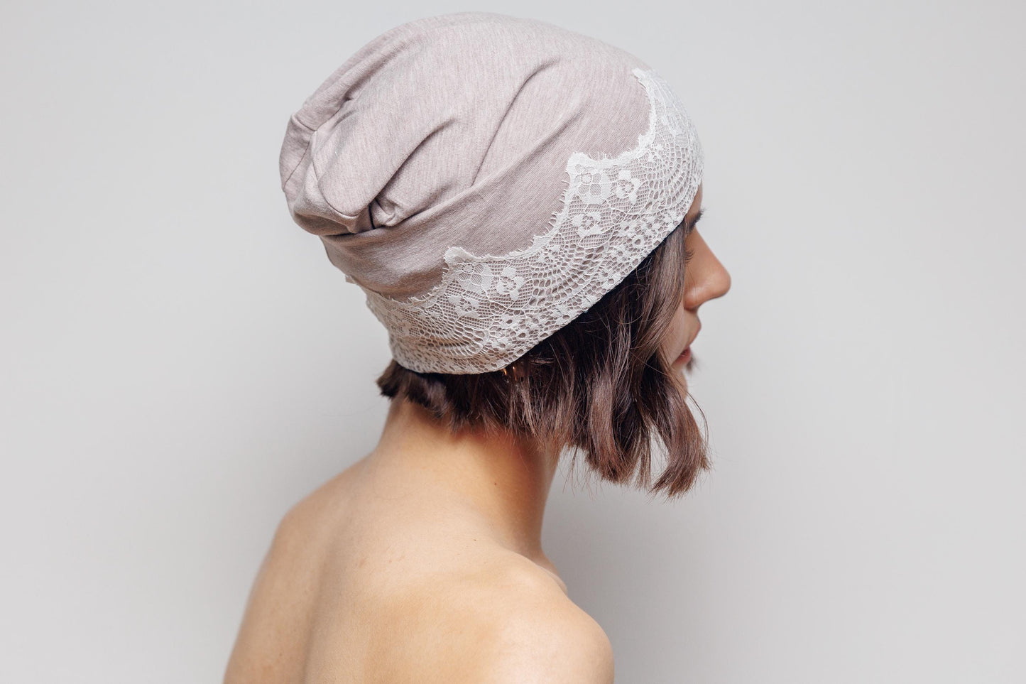 Beige slouchy beanie hat with lace. Cotton headwear size S.