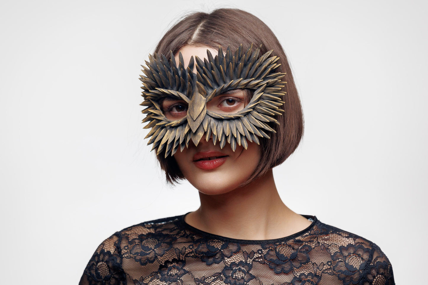 Feather Masquerade Owl Mask: Black and Gold Mask.