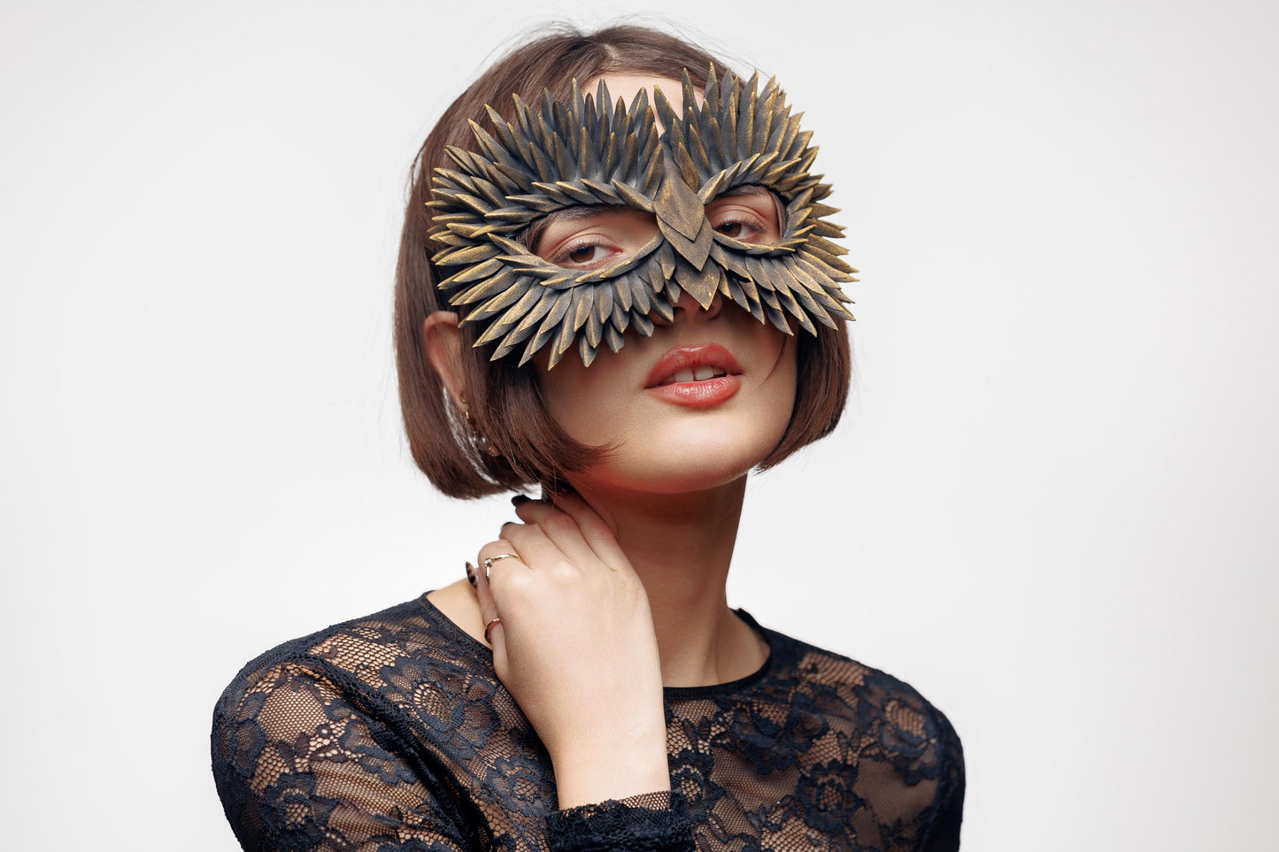 Feather Masquerade Owl Mask: Black and Gold Mask.
